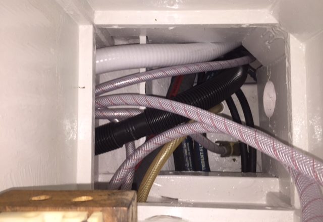 Another access point to plumbing in the galley